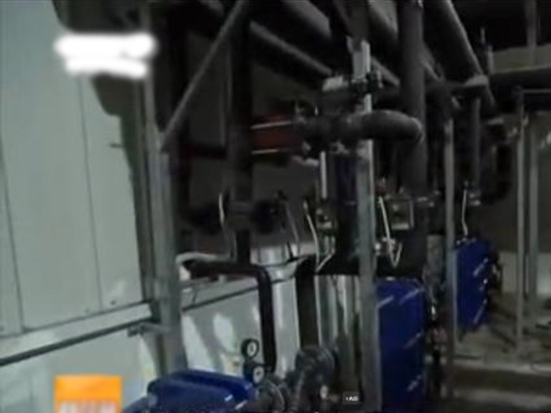 Low temperature heat pump central heating project for salmon farms